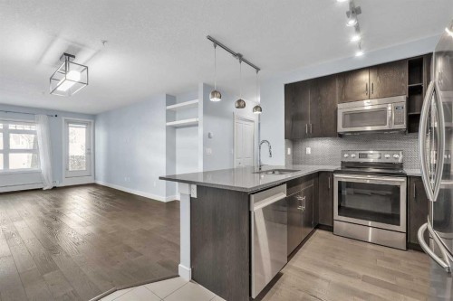 111-25 Auburn Meadows Avenue Se, Calgary, AB - Indoor Photo Showing Kitchen With Stainless Steel Kitchen With Upgraded Kitchen