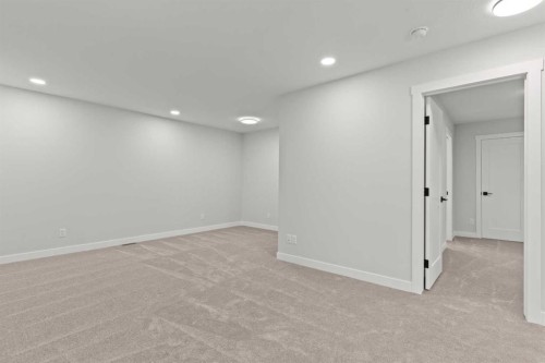 471 Kinniburgh Loop, Chestermere, AB - Indoor Photo Showing Other Room