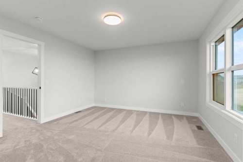 471 Kinniburgh Loop, Chestermere, AB - Indoor Photo Showing Other Room