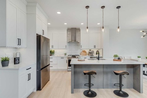 471 Kinniburgh Loop, Chestermere, AB - Indoor Photo Showing Kitchen With Stainless Steel Kitchen With Upgraded Kitchen