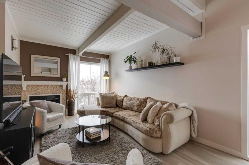 2630 Oakmoor Drive Sw, Calgary, AB - Indoor Photo Showing Living Room With Fireplace