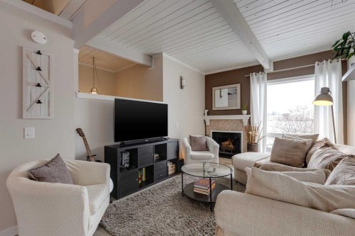 2630 Oakmoor Drive Sw, Calgary, AB - Indoor Photo Showing Living Room With Fireplace