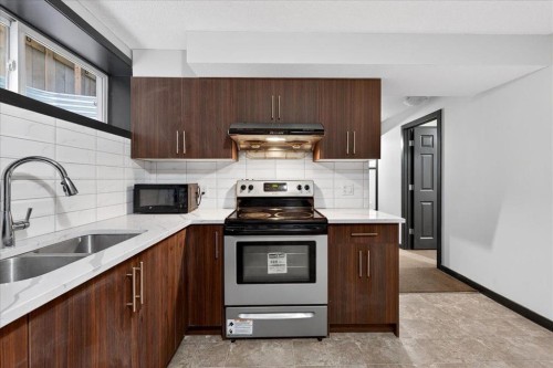 135 Skyview Springs Manor Ne, Calgary, AB - Indoor Photo Showing Kitchen With Double Sink