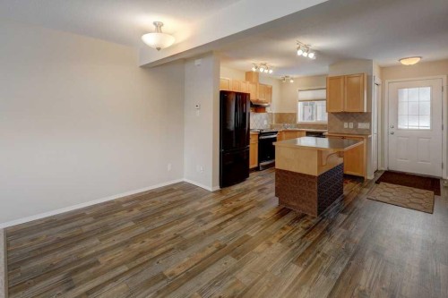 1402-140 Sagewood Boulevard Sw, Airdrie, AB - Indoor Photo Showing Kitchen