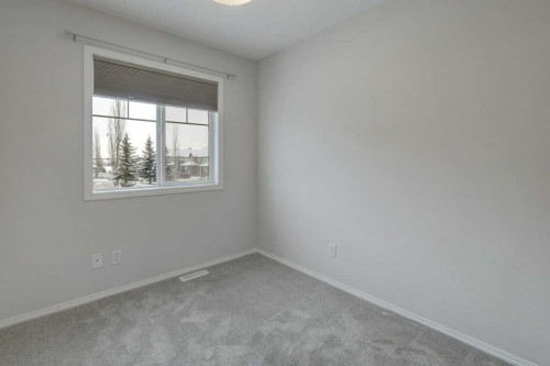 1402-140 Sagewood Boulevard Sw, Airdrie, AB - Indoor Photo Showing Other Room