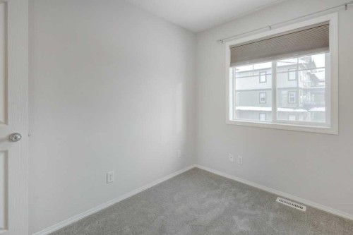 1402-140 Sagewood Boulevard Sw, Airdrie, AB - Indoor Photo Showing Other Room