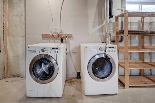 1402-140 Sagewood Boulevard Sw, Airdrie, AB - Indoor Photo Showing Laundry Room