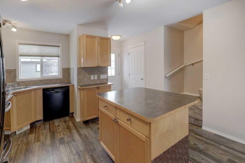 1402-140 Sagewood Boulevard Sw, Airdrie, AB - Indoor Photo Showing Kitchen