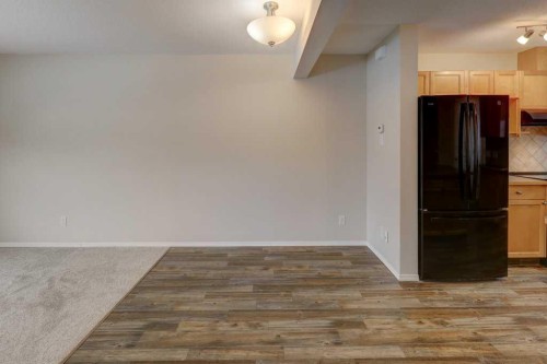 1402-140 Sagewood Boulevard Sw, Airdrie, AB - Indoor Photo Showing Kitchen