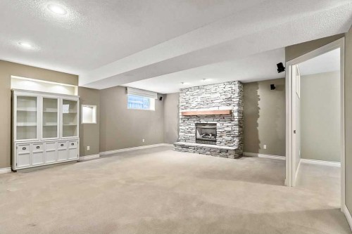 13 Sheep River Link, Okotoks, AB - Indoor With Fireplace