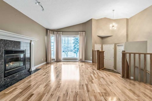 13 Sheep River Link, Okotoks, AB - Indoor With Fireplace