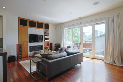 1707 Broadview Road Nw, Calgary, AB - Indoor Photo Showing Living Room With Fireplace