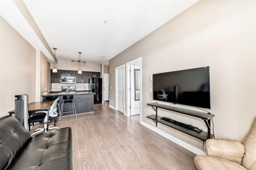 311-117 Copperpond Common Se, Calgary, AB - Indoor Photo Showing Living Room