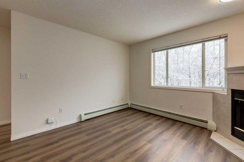 310-30 Sierra Morena Mews Sw, Calgary, AB - Indoor Photo Showing Other Room