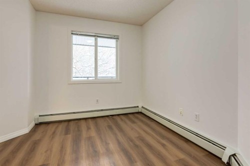 310-30 Sierra Morena Mews Sw, Calgary, AB - Indoor Photo Showing Other Room