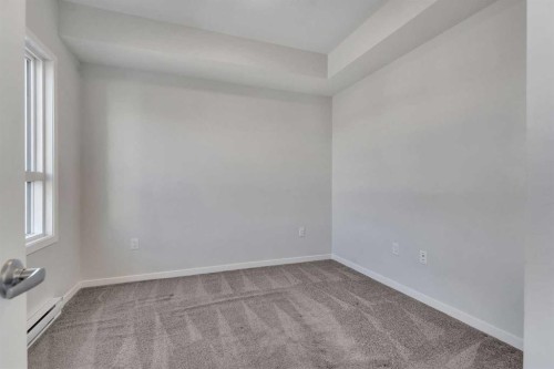 201-360 Harvest Hills Way Ne, Calgary, AB - Indoor Photo Showing Other Room