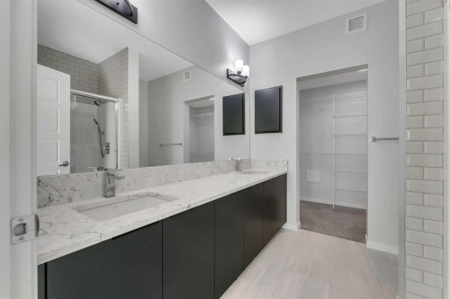 201-360 Harvest Hills Way Ne, Calgary, AB - Indoor Photo Showing Bathroom