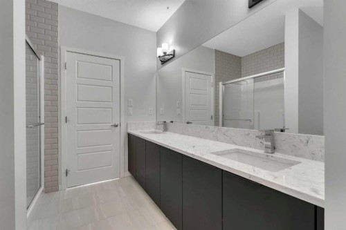 201-360 Harvest Hills Way Ne, Calgary, AB - Indoor Photo Showing Bathroom