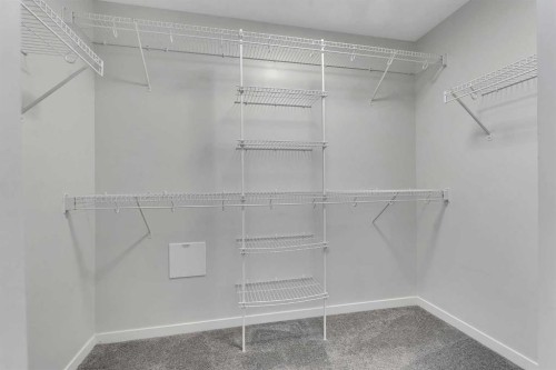 201-360 Harvest Hills Way Ne, Calgary, AB - Indoor With Storage