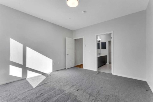 201-360 Harvest Hills Way Ne, Calgary, AB - Indoor Photo Showing Other Room