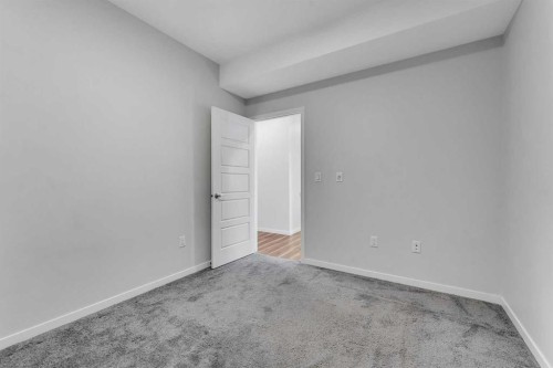 201-360 Harvest Hills Way Ne, Calgary, AB - Indoor Photo Showing Other Room