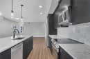 201-360 Harvest Hills Way Ne, Calgary, AB  - Indoor Photo Showing Kitchen With Upgraded Kitchen 