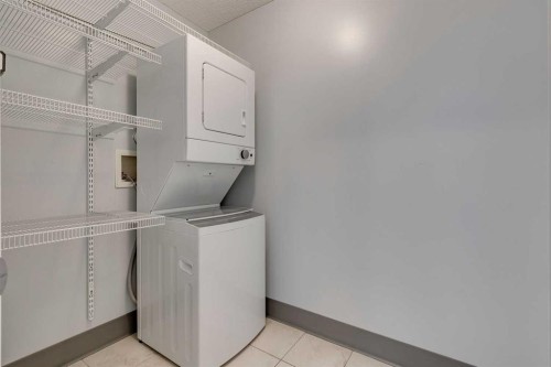 119-2022 Canyon Meadows Drive Se, Calgary, AB - Indoor Photo Showing Laundry Room