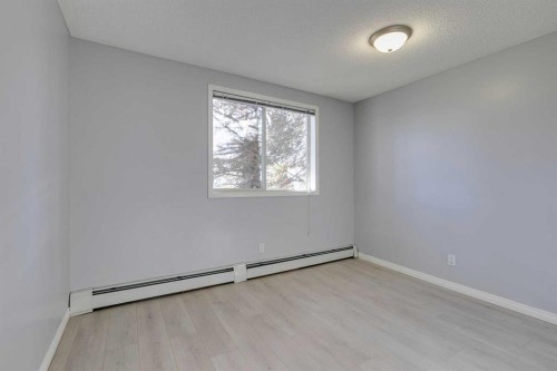 119-2022 Canyon Meadows Drive Se, Calgary, AB - Indoor Photo Showing Other Room