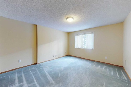 19 Signature Villas Sw, Calgary, AB - Indoor Photo Showing Other Room