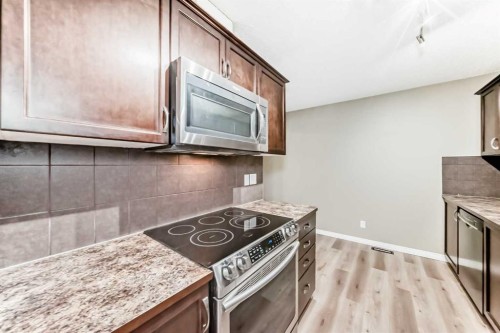 3019 Windsong Boulevard Sw, Airdrie, AB - Indoor Photo Showing Kitchen