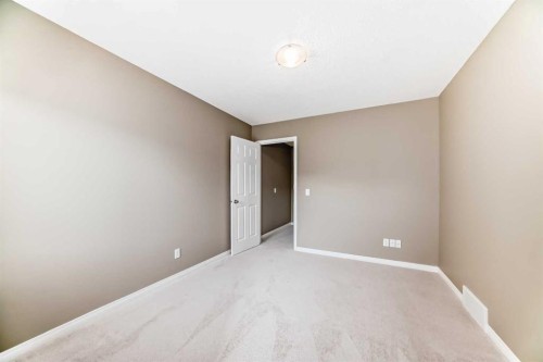 3019 Windsong Boulevard Sw, Airdrie, AB - Indoor Photo Showing Other Room