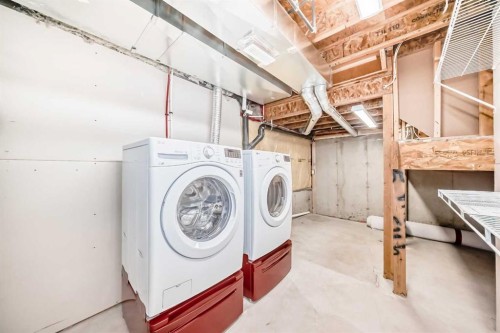 3019 Windsong Boulevard Sw, Airdrie, AB - Indoor Photo Showing Laundry Room