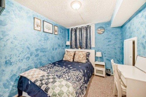 33 Martinridge Road Ne, Calgary, AB - Indoor Photo Showing Bedroom