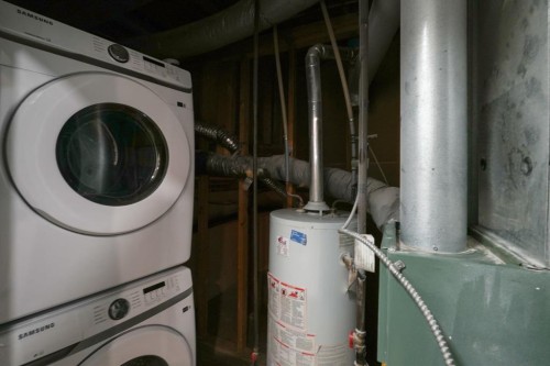 96 Falshire Drive Ne, Calgary, AB - Indoor Photo Showing Laundry Room