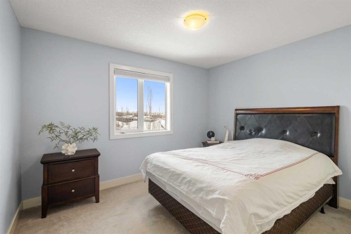 86 Royal Ridge Mount Nw, Calgary, AB - Indoor Photo Showing Bedroom