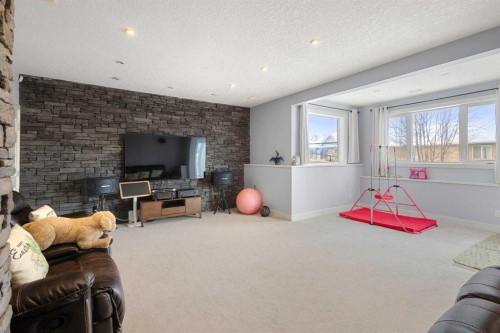 86 Royal Ridge Mount Nw, Calgary, AB - Indoor With Fireplace