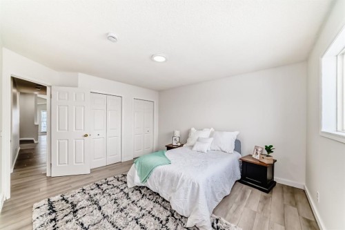 34 Erin Meadow Close Se, Calgary, AB - Indoor Photo Showing Bedroom