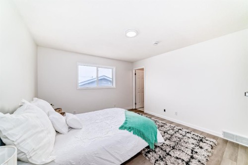 34 Erin Meadow Close Se, Calgary, AB - Indoor Photo Showing Bedroom