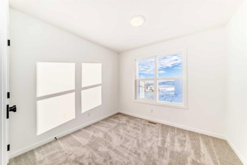 55 Bartlett Row Se, Calgary, AB - Indoor Photo Showing Other Room