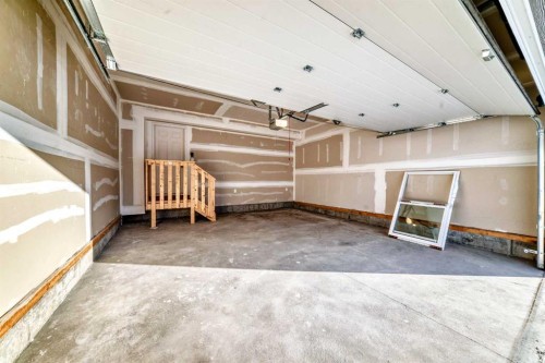 55 Bartlett Row Se, Calgary, AB - Indoor Photo Showing Garage