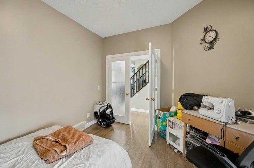 91 Panatella Close Nw, Calgary, AB - Indoor Photo Showing Bedroom