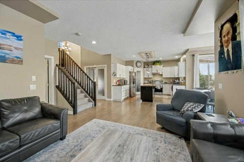 91 Panatella Close Nw, Calgary, AB - Indoor Photo Showing Living Room