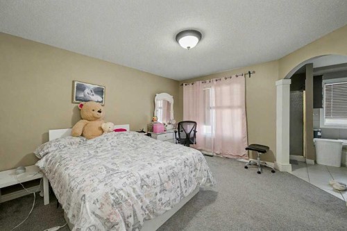 91 Panatella Close Nw, Calgary, AB - Indoor Photo Showing Bedroom