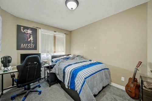 91 Panatella Close Nw, Calgary, AB - Indoor Photo Showing Bedroom