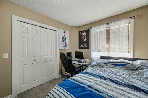 91 Panatella Close Nw, Calgary, AB - Indoor Photo Showing Bedroom
