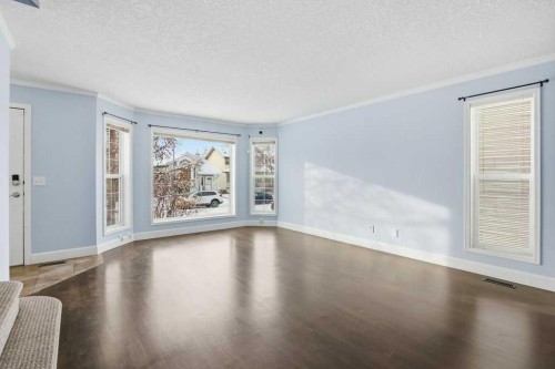 216 Mt. Aberdeen Close Se, Calgary, AB - Indoor Photo Showing Living Room
