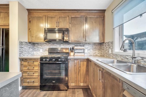 96 Auburn Meadows Boulevard Se, Calgary, AB - Indoor Photo Showing Kitchen With Double Sink