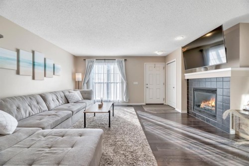 96 Auburn Meadows Boulevard Se, Calgary, AB - Indoor Photo Showing Living Room With Fireplace