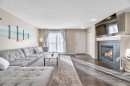 96 Auburn Meadows Boulevard Se, Calgary, AB  - Indoor Photo Showing Living Room With Fireplace 
