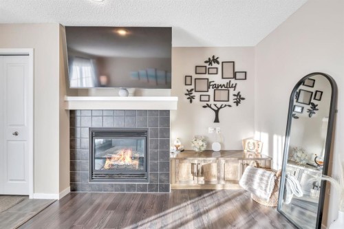 96 Auburn Meadows Boulevard Se, Calgary, AB - Indoor Photo Showing Other Room With Fireplace
